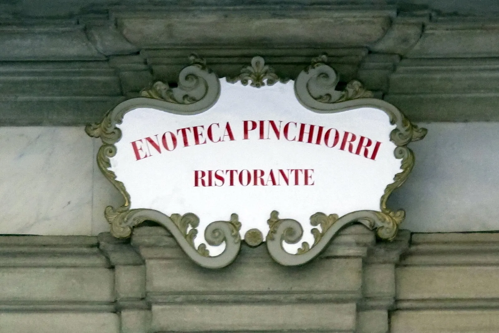 The Enoteca Pinchiorri sign on Palazzo Jacometti-Ciofi, Via Ghibellina