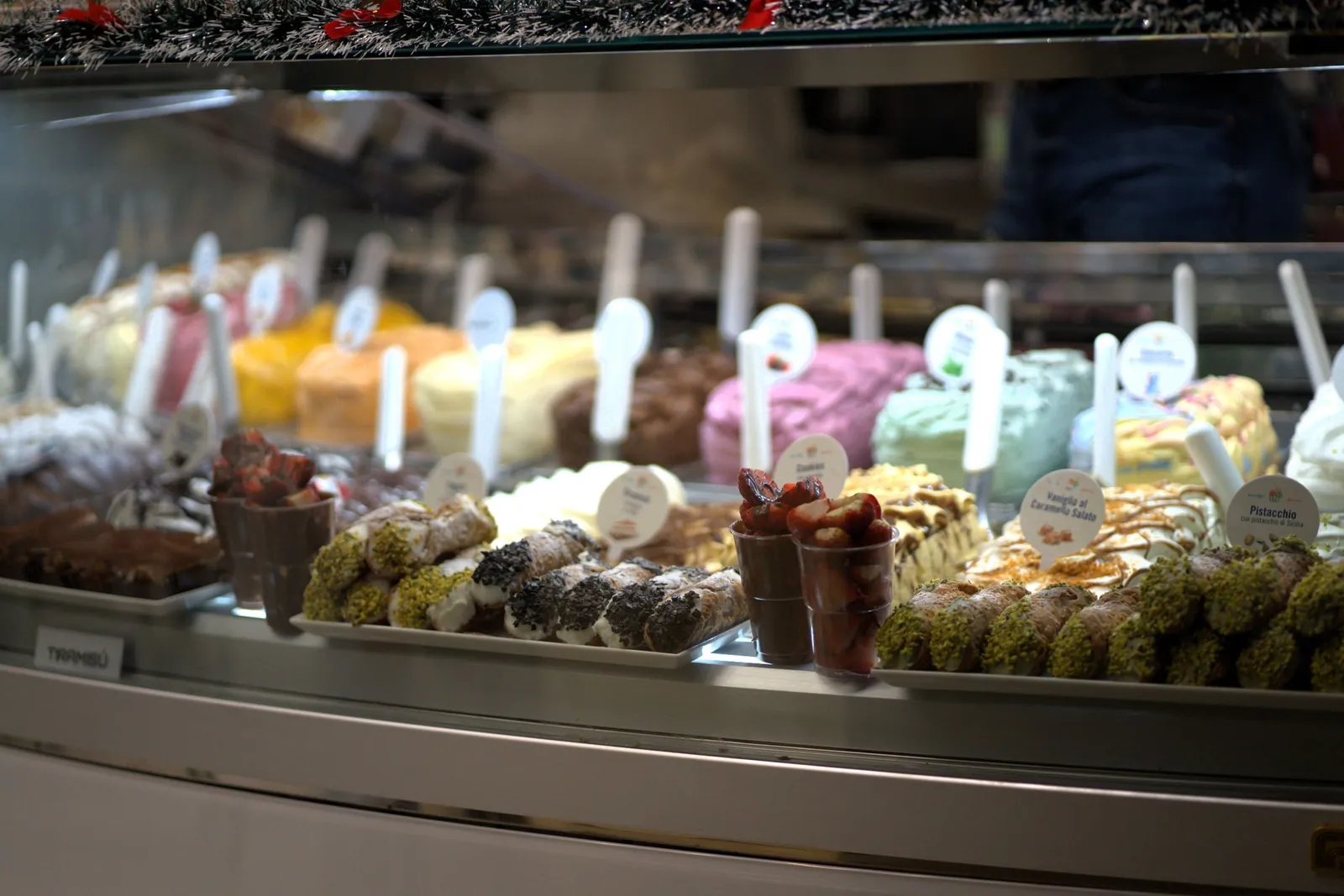 Gelato and desserts in a shop counter in Florence