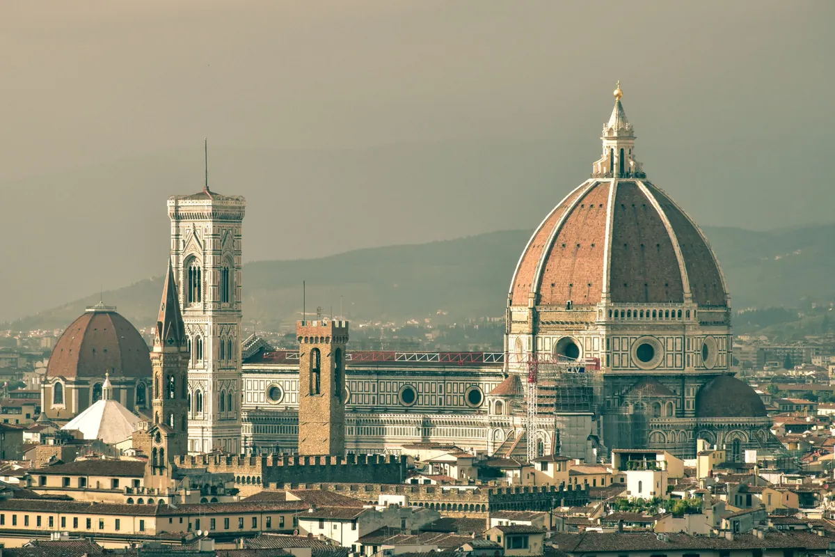 The Duomo and bell tower above the rooftops of the historic centre