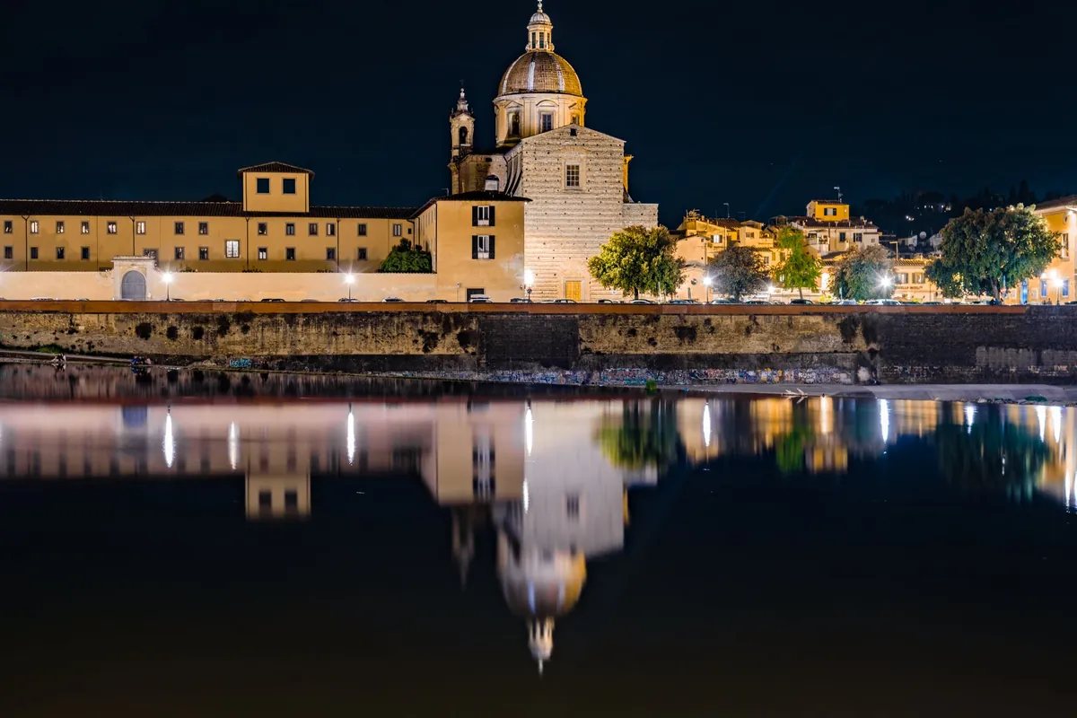 San Frediano in Cestello reflected in the Arno at night